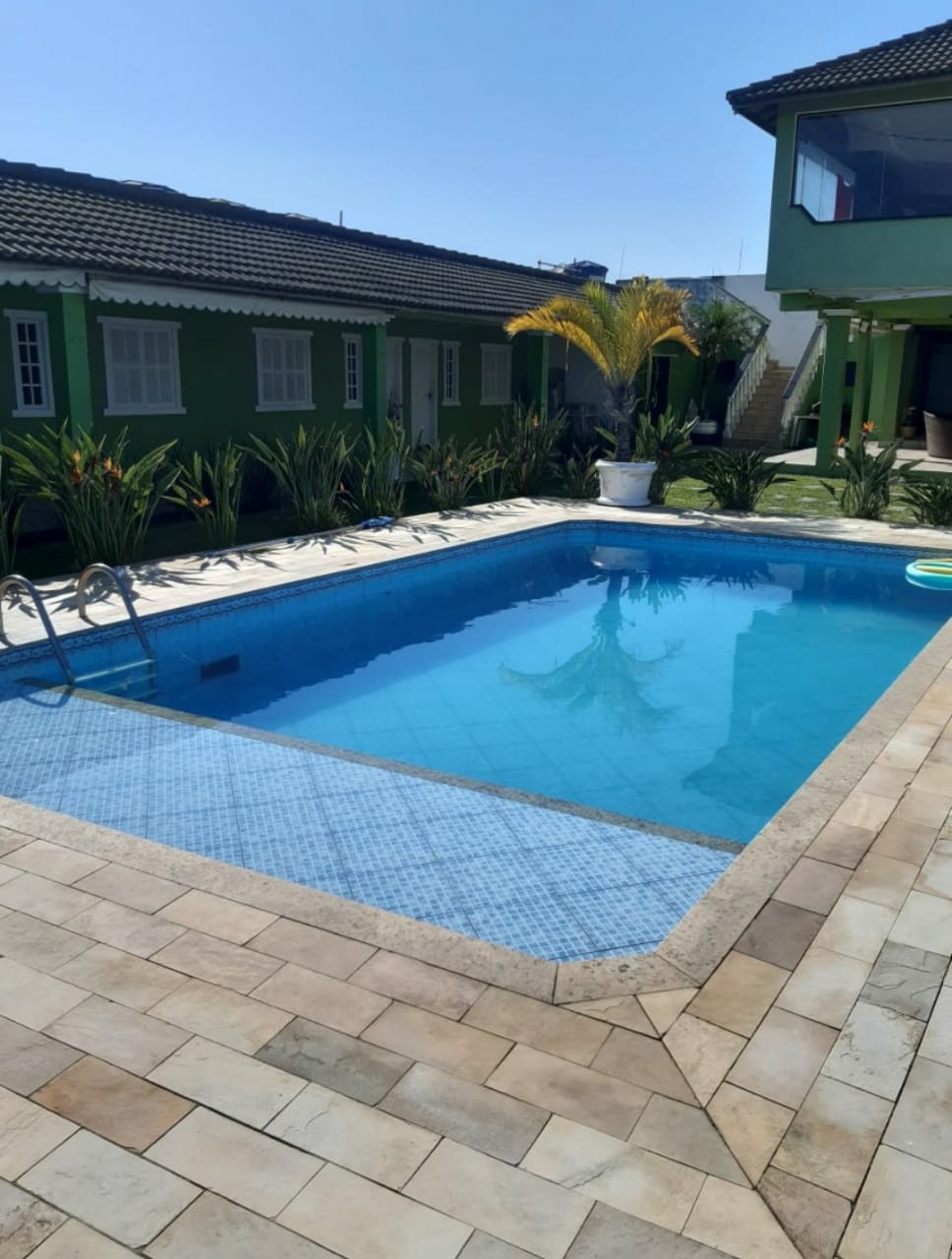 Área de lazer e jardim do Flat Summer